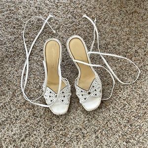 White leather mid length high heels made in Brazil.